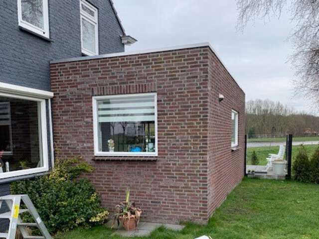 Aanbouw bekleding met Ayous